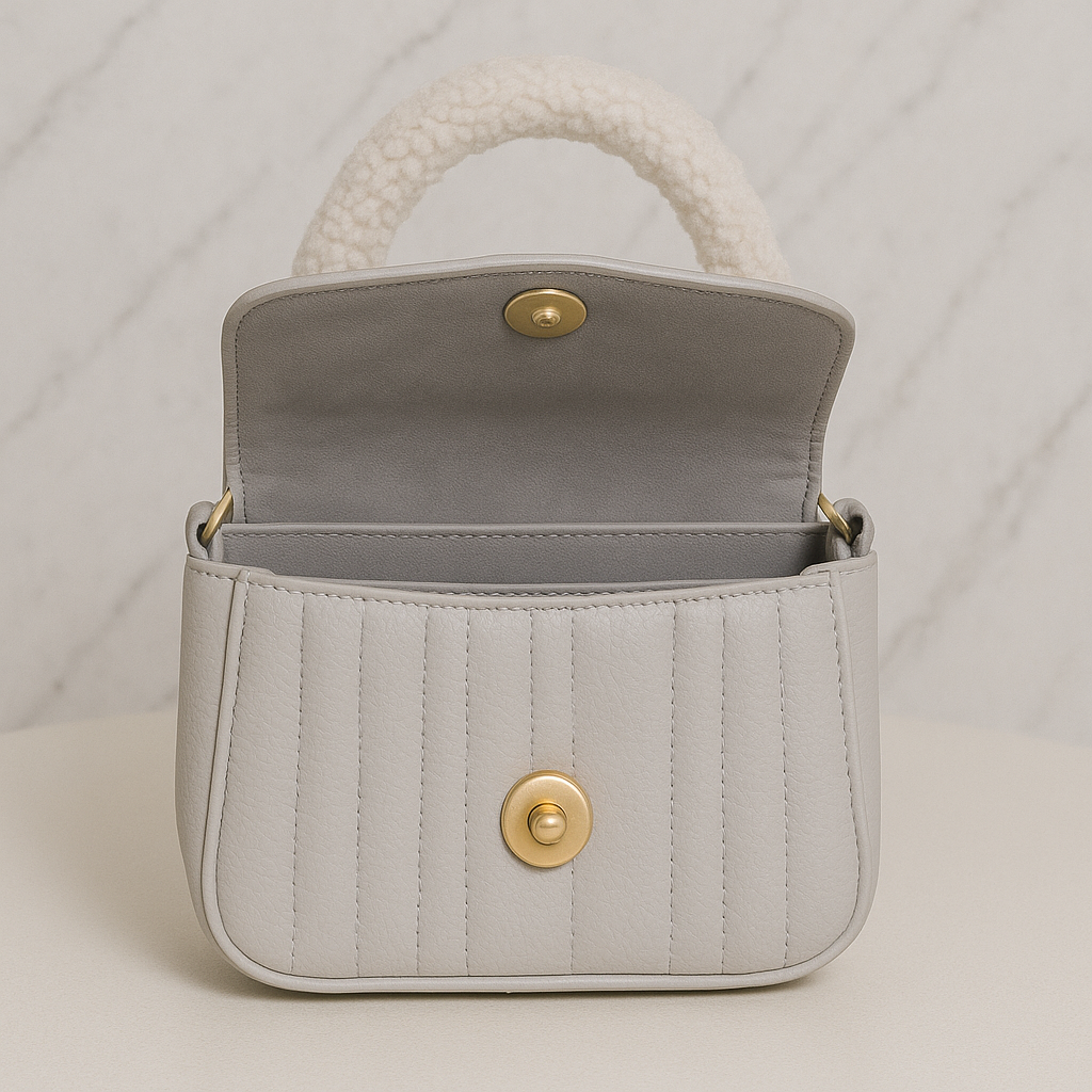 Ivory Elegance Quilted Handbag